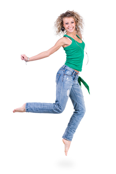 young dancer woman jumping against white background - Fotó, kép