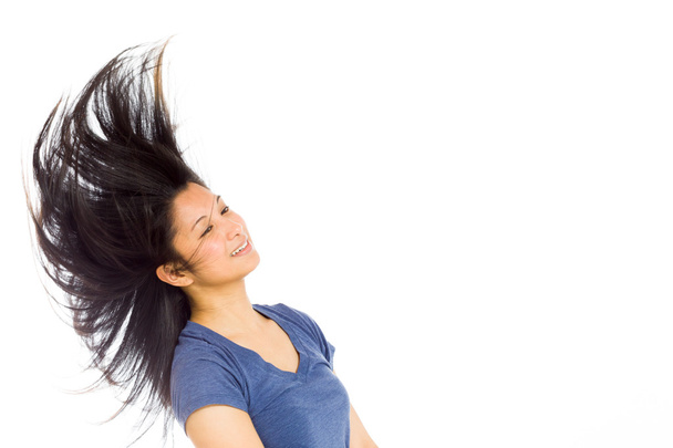 Model energetic shaking her hair - Φωτογραφία, εικόνα