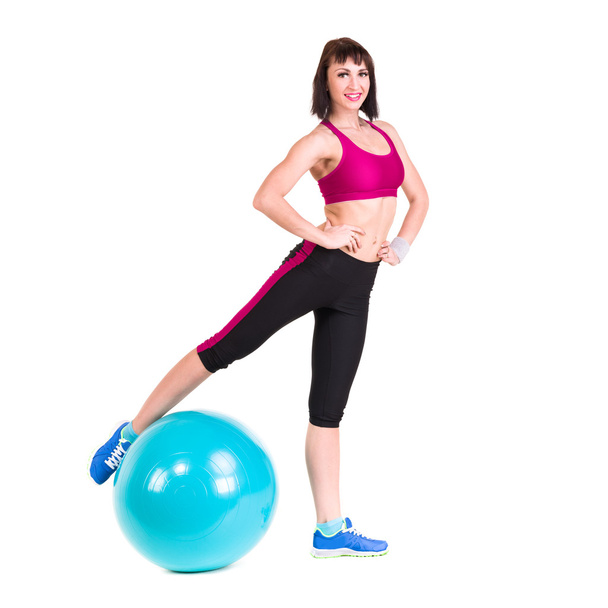 Young smiling woman makes exercise with fitball - Zdjęcie, obraz