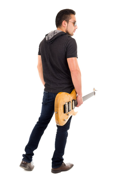 young guy holding electric guitar - Valokuva, kuva