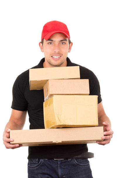 happy friendly confident delivery man carrying boxes - Foto, imagen