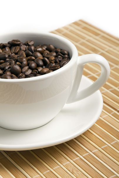 Coffee beans in a cup - Φωτογραφία, εικόνα