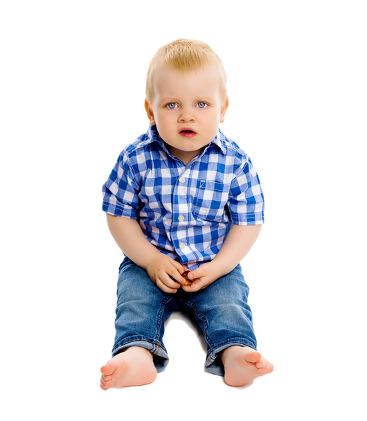 little boy in a plaid shirt and jeans - Fotoğraf, Görsel
