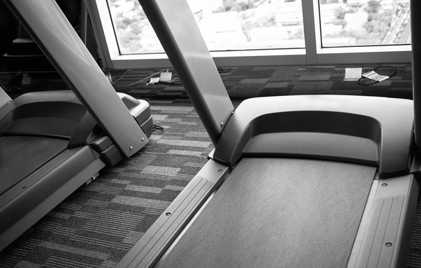 Treadmills in  fitness gym black and white - Photo, Image