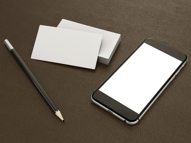White business cards blank and smartfon mockup on leather background - Zdjęcie, obraz