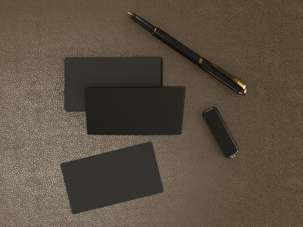 Black business cards blank mockup on leather background - Foto, Imagem