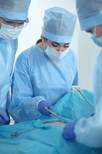 Young surgery team in the operating room - Foto, Bild