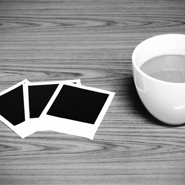 coffee cup with photo frame black and white color tone style - Foto, Imagen