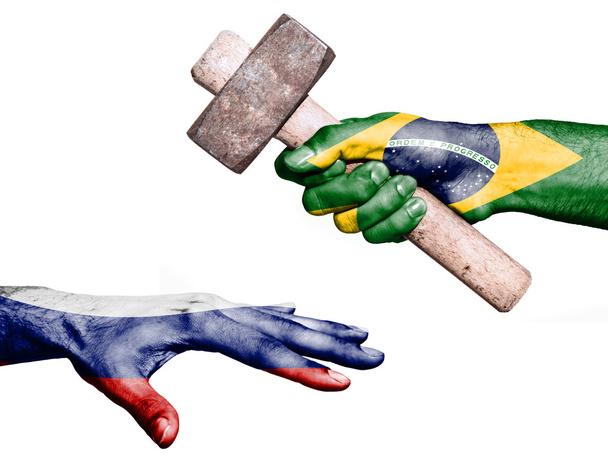 Brazil hitting Russia with a heavy hammer - Photo, Image