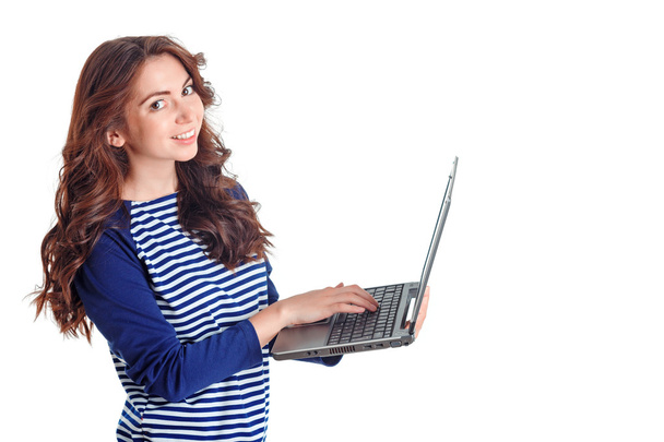 Smiling girl holding laptop  - Foto, Imagen
