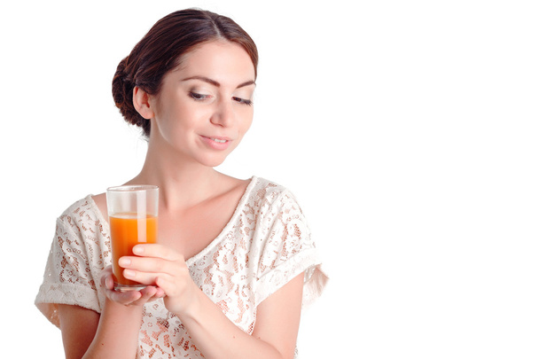 Pretty young girl drinking juice  - 写真・画像
