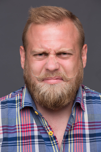 Discontented bearded man - Fotografie, Obrázek