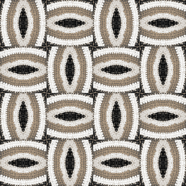  Абстрактний візерунок з в'язаних частин килимка
 - Фото, зображення