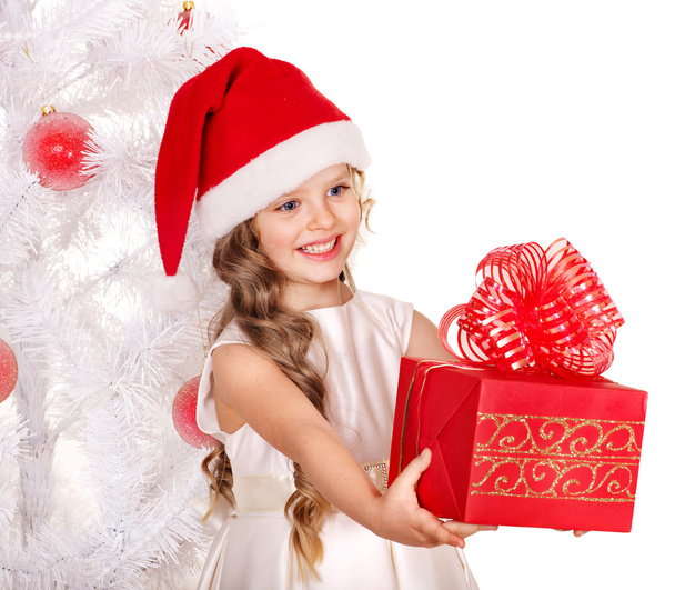 Kid giving Christmas gift box. - Foto, afbeelding