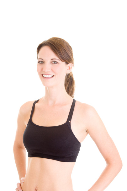 Smiling Caucasian Woman in Sports Bra White Background - Photo, Image