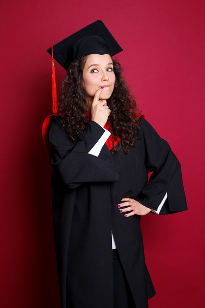 Жінка-студент у випускному платті
 - Фото, зображення