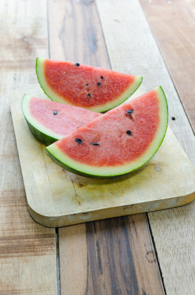 Slice Fresh Watermelon on wood background  - Foto, imagen