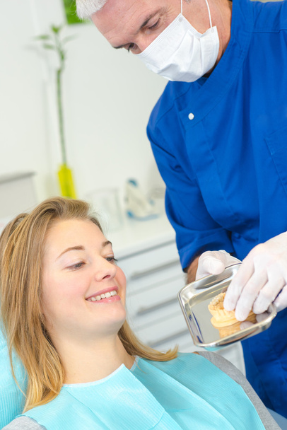 Dentist with a female patient - Photo, image