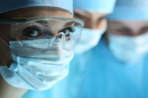 Female surgeon portrait looking in camera - Foto, Imagem