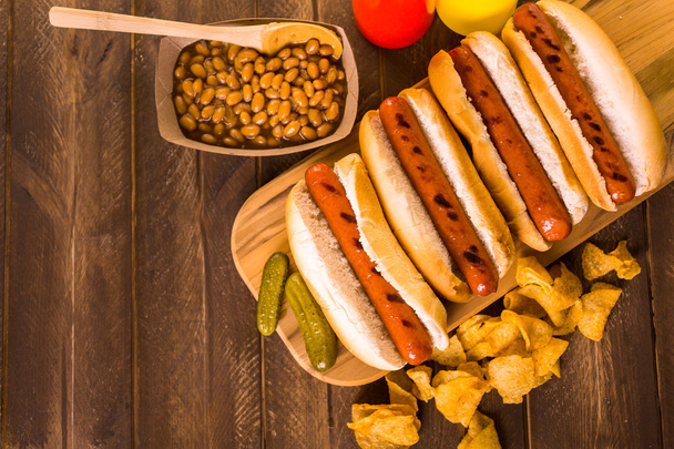 Grilled hot dogs on a white hot dog buns - Photo, Image