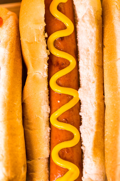 Grilled hot dogs with mustard and ketchup - Fotoğraf, Görsel