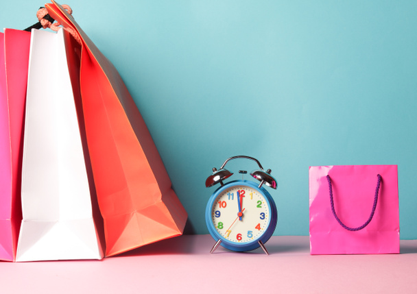 Shopping bags with clock  - Photo, Image
