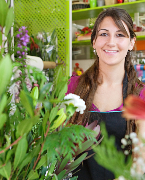 florist woman works in her store - Photo, Image