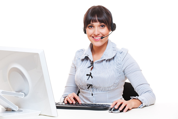 Operatore telefonico sorridente sul posto di lavoro
 - Foto, immagini