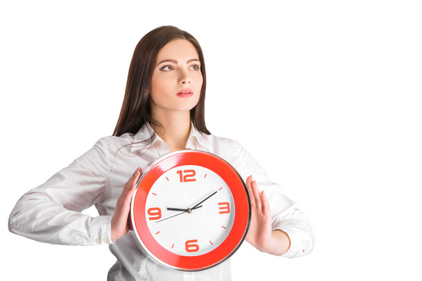 businesswoman holding  clock - Фото, зображення
