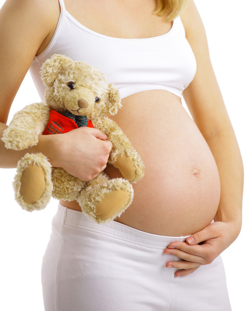 těhotná žena touchgin její břicho - Fotografie, Obrázek