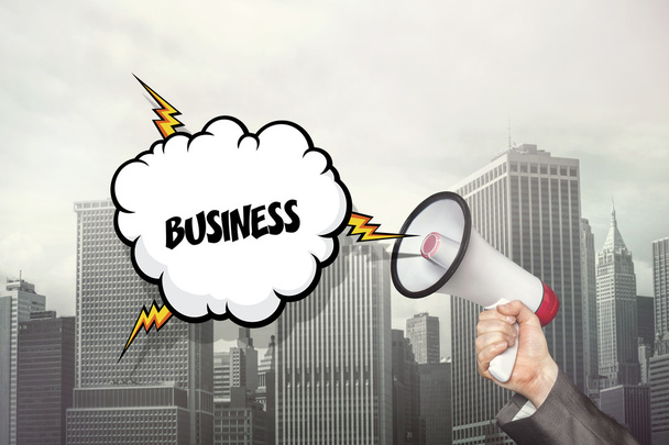 Business text on speech bubble and businessman hand holding megaphone - Fotografie, Obrázek