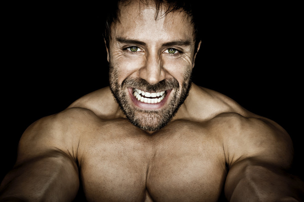 Angry muscled bodybuilding man - Fotografie, Obrázek