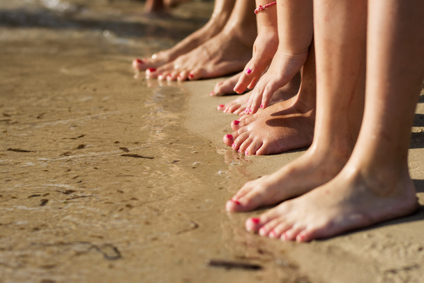 Barefoot family in the sand - Foto, imagen