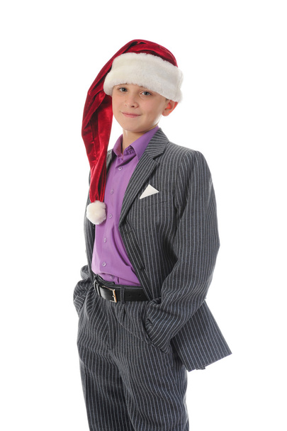 Cheerful boy in Santa Claus hat - Foto, immagini