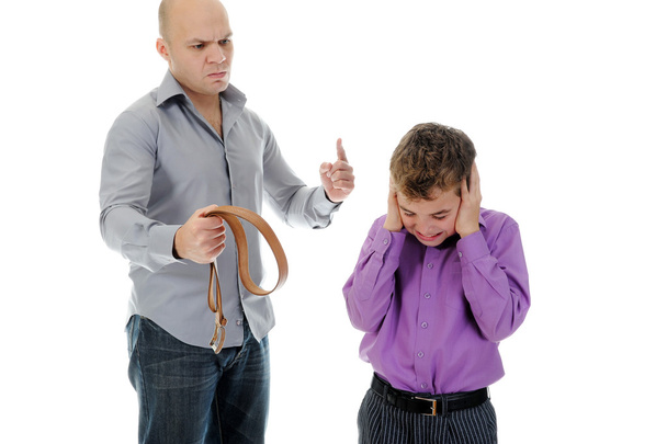 Strict father punishes his son - Photo, image