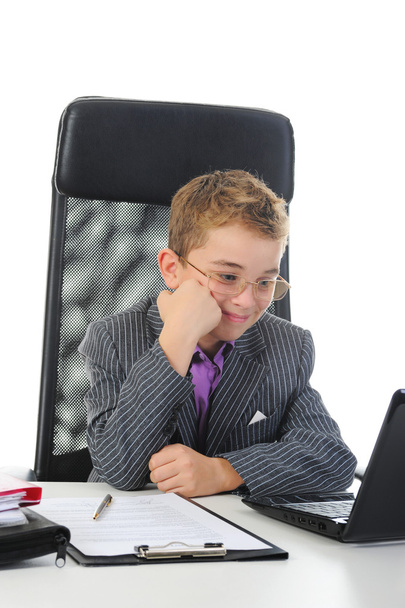 Young businessman using a laptop - Фото, изображение