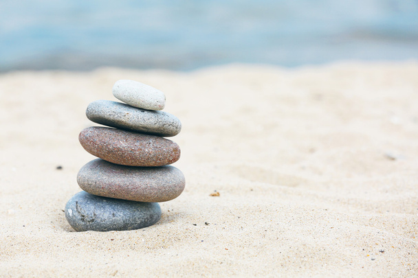 Zen stones balance spa on beach - Foto, Imagen