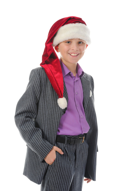 Cheerful boy in Santa Claus hat - Fotoğraf, Görsel
