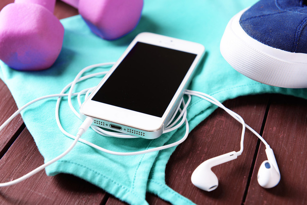 Mobile phone and earphones with set for sports - Photo, Image