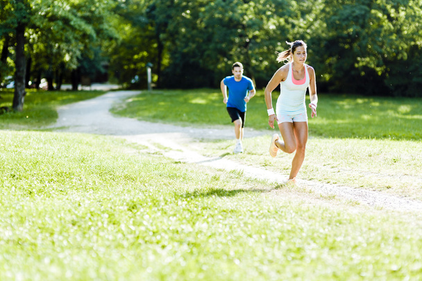 Young people jogging in nature - Foto, Imagem