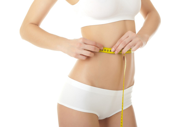 Woman measuring shape of waist - Фото, зображення
