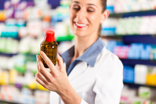 Female pharmacist in her pharmacy - Photo, Image