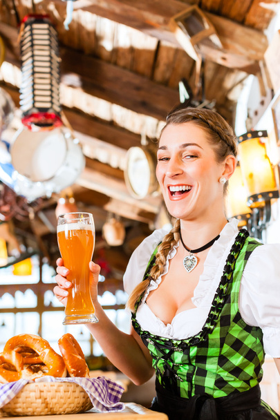 Bavarian woman drinking wheat beer - Photo, Image