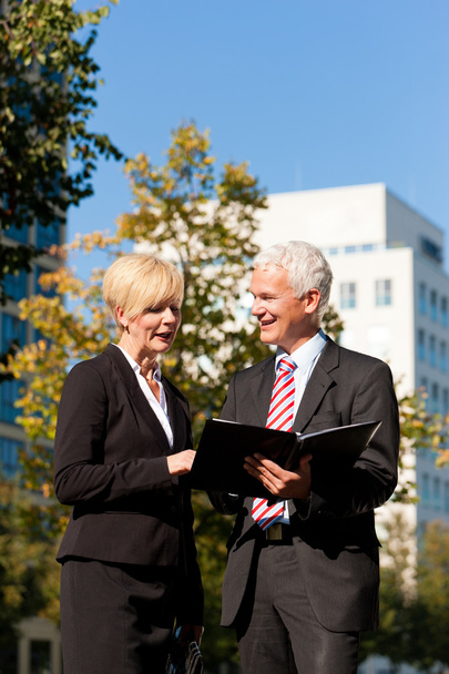 Business people talking outdoors - Photo, Image
