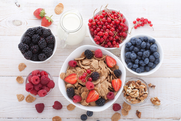 Breakfast - berries, fruit and muesli - Photo, Image