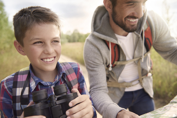 father and son with binoculars - Photo, Image