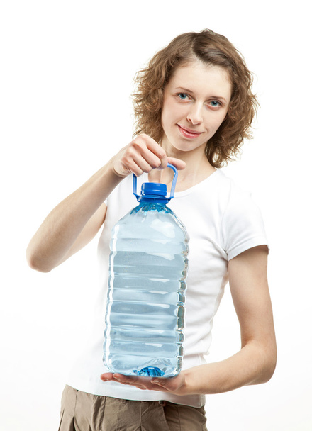Woman holding bottle of water - Valokuva, kuva
