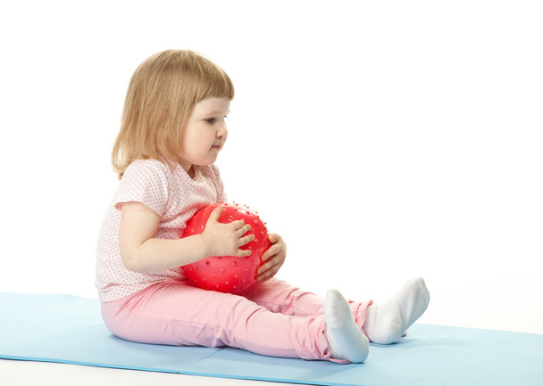 Girl doing exercises with a ball - Foto, Imagem