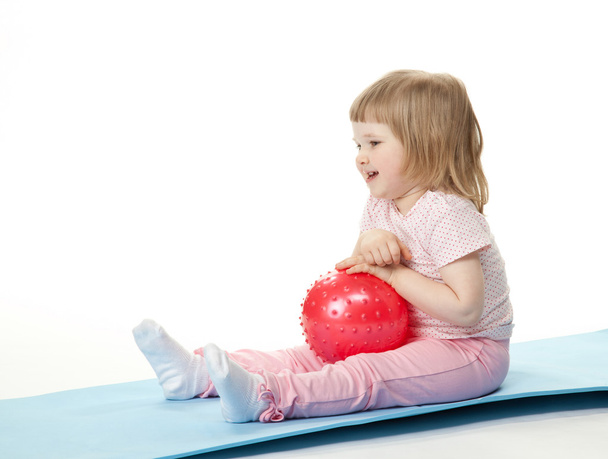Girl doing exercises with a ball - Foto, Imagen