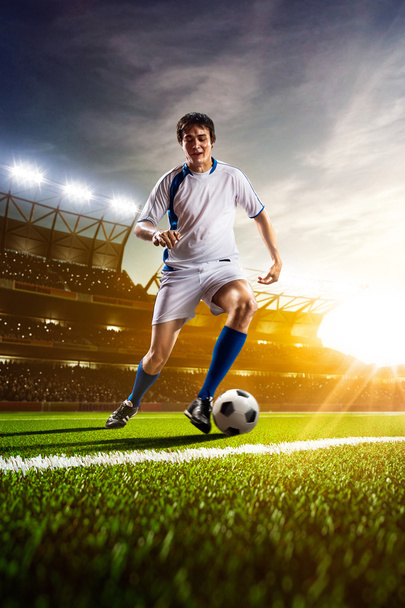 Soccer player in action panorama - Zdjęcie, obraz